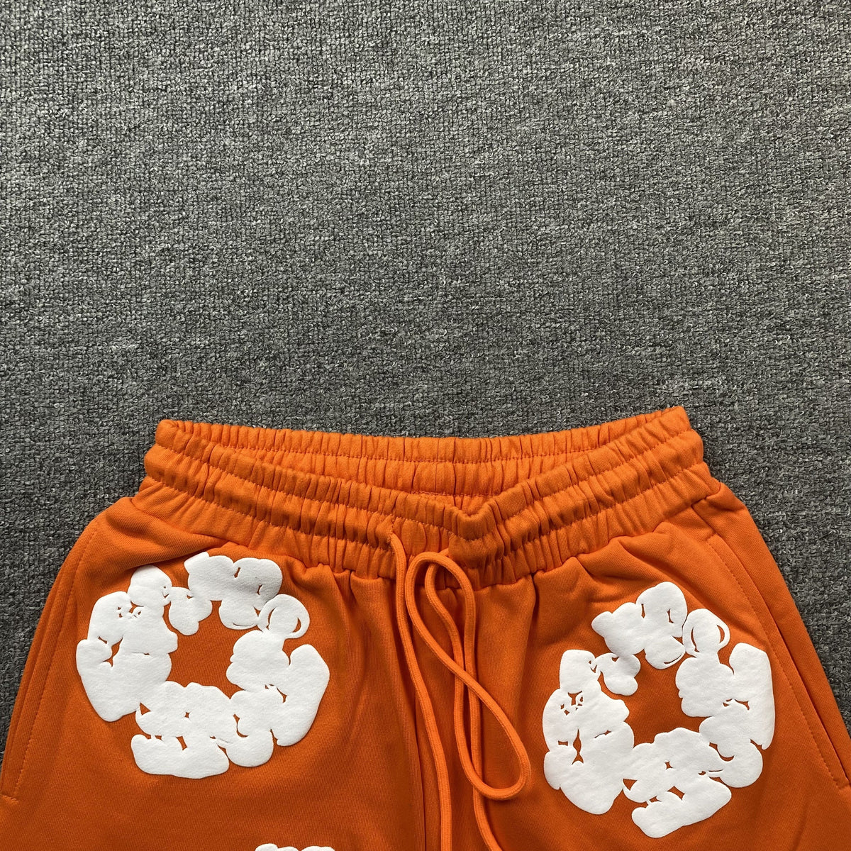 DENIM TEARS COTTON WREATH SHORTS ORANGE