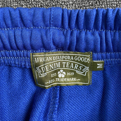 DENIM TEARS COTTON WREATH SWEATPANTS DEEP BLUE - netstar