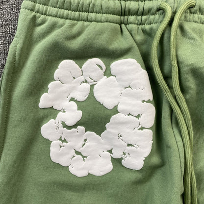 DENIM TEARS COTTON WREATH SWEATPANTS LIGHT GREEN - netstar